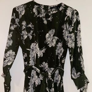 Ladies dress, beautiful dark green with white flowers. Size large . Back zipper.